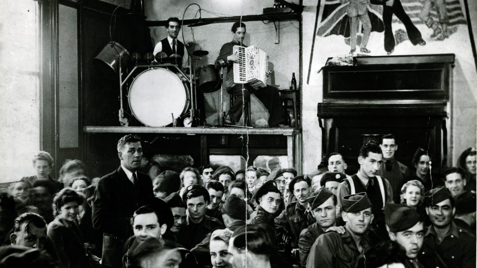 Historic photo of band on the Wall stage